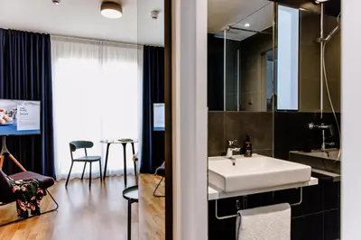 Ein Badezimmer in der Unterkunft THE FLAG Meiller Gärten
