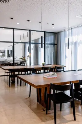 Ein Restaurant oder anderes Speiselokal in der Unterkunft THE FLAG Meiller Gärten