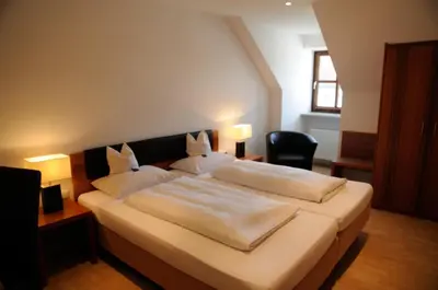 Ein Bett oder Betten in einem Zimmer der Unterkunft Boardinghouse Wadenspanner