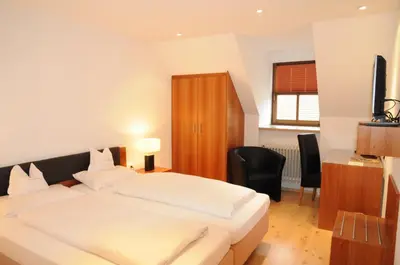 Ein Bett oder Betten in einem Zimmer der Unterkunft Boardinghouse Wadenspanner