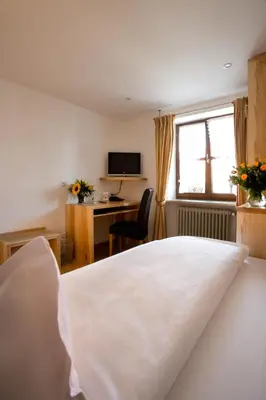 Ein Bett oder Betten in einem Zimmer der Unterkunft Boardinghouse Wadenspanner