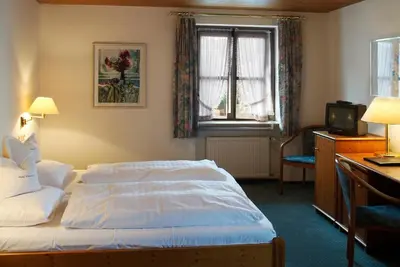 Ein Bett oder Betten in einem Zimmer der Unterkunft Boardinghouse Wadenspanner