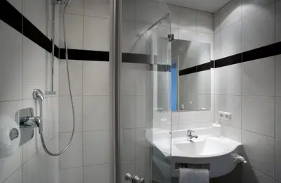 Ein Badezimmer in der Unterkunft Boardinghouse Wadenspanner