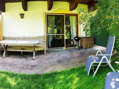Ein Garten an der Unterkunft Weissenhof | Chiemgau Karte
