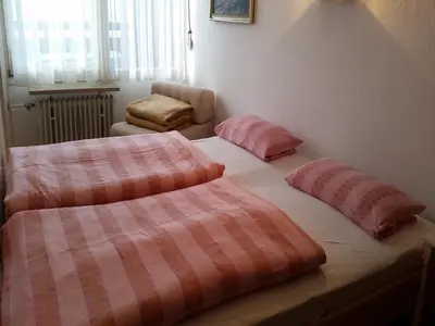 Ein Bett oder Betten in einem Zimmer der Unterkunft Alpenwohnanlage Lott
