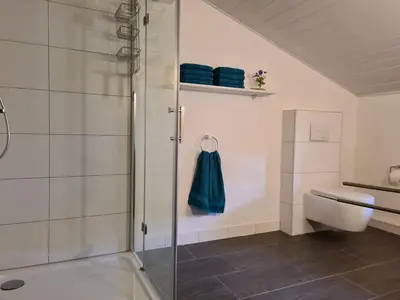 Ein Badezimmer in der Unterkunft Ferienwohnung Obermeier | Chiemgau Karte
