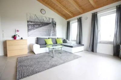Ein Sitzbereich in der Unterkunft Ferienwohnung Stocker