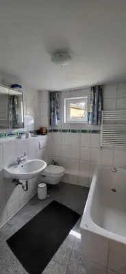 Ein Badezimmer in der Unterkunft Ferienwohnungen Heinrichsberger