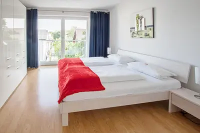 Ein Bett oder Betten in einem Zimmer der Unterkunft Traum-Ferienwohnung Alpenblick