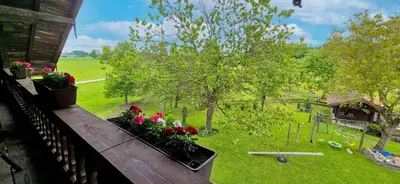 Ein Garten an der Unterkunft Baumgartner Nagerhof | Chiemgau Karte