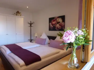 Ein Bett oder Betten in einem Zimmer der Unterkunft Ferienwohnung Schreiner-Viehhausen