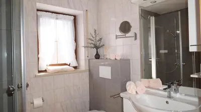 Ein Badezimmer in der Unterkunft Ferienwohnung Rabe