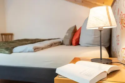 Ein Bett oder Betten in einem Zimmer der Unterkunft Ferienwohnungen Beim Plößl