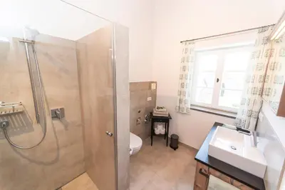 Ein Badezimmer in der Unterkunft Ferienwohnungen Beim Plößl