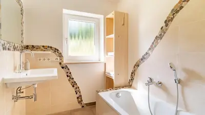 Ein Badezimmer in der Unterkunft Ferienhaus Achental mit Sauna