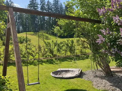 Ein Garten an der Unterkunft Ferienhaus Achental mit Sauna