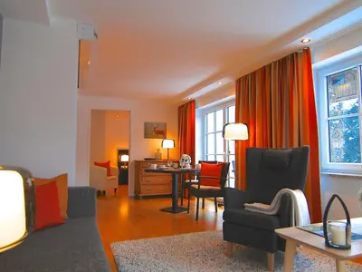Ein Sitzbereich in der Unterkunft Hubertus Apartments
