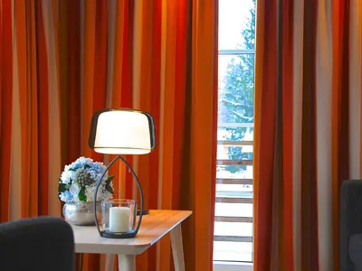 Ein Sitzbereich in der Unterkunft Hubertus Apartments