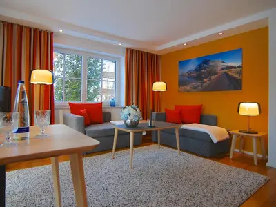 Ein Bett oder Betten in einem Zimmer der Unterkunft Hubertus Apartments