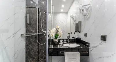 Ein Badezimmer in der Unterkunft PLAZA INN Mühldorf