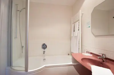 Ein Badezimmer in der Unterkunft Hotel Schwaiger