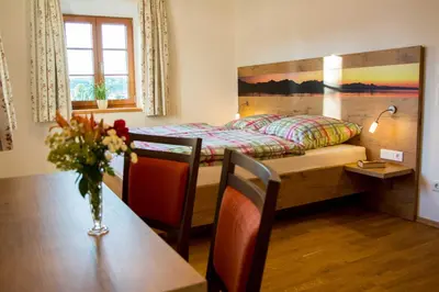 Ein Bett oder Betten in einem Zimmer der Unterkunft Heimhilgerhof