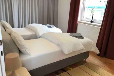 Ein Bett oder Betten in einem Zimmer der Unterkunft Charmant Leben im Textilviertel - stilvolle Wohnung - zentral und ruhig