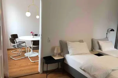 Ein Bett oder Betten in einem Zimmer der Unterkunft Charmant Leben im Textilviertel - stilvolle Wohnung - zentral und ruhig