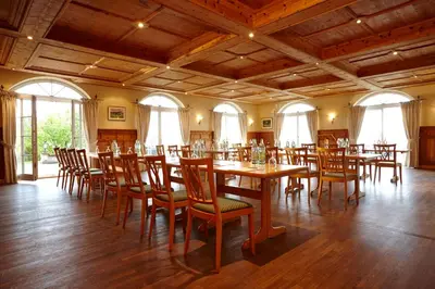 Ein Restaurant oder anderes Speiselokal in der Unterkunft Aschbacher Hof