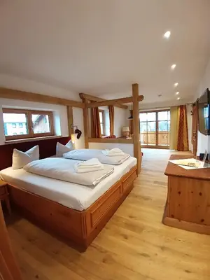 Ein Bett oder Betten in einem Zimmer der Unterkunft Gasthof Ochsenwirt