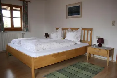 Ein Bett oder Betten in einem Zimmer der Unterkunft Zaissererhof