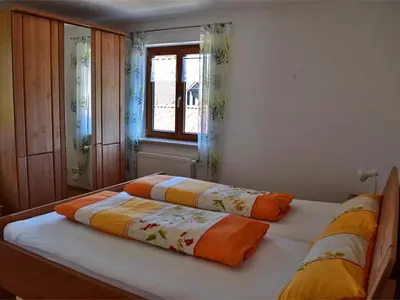 Ein Bett oder Betten in einem Zimmer der Unterkunft Ferienwohnung Irmgard