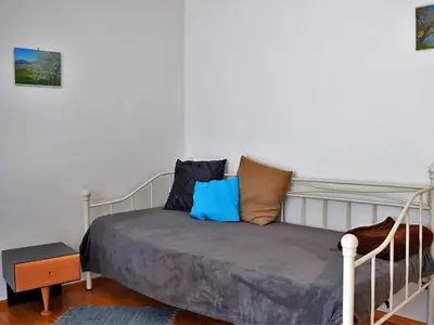 Ein Bett oder Betten in einem Zimmer der Unterkunft Ferienwohnung Irmgard