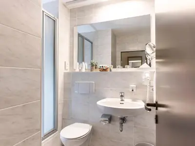 Ein Badezimmer in der Unterkunft Hotel Am Moosfeld