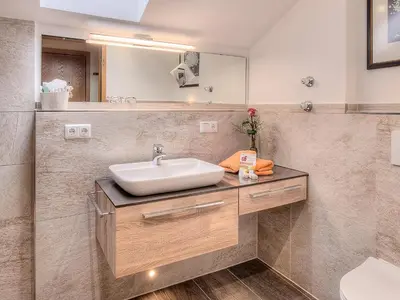 Ein Badezimmer in der Unterkunft Landgasthof Aumanwirt