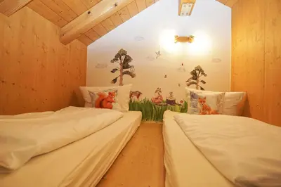 Ein Bett oder Betten in einem Zimmer der Unterkunft Wachingerhof
