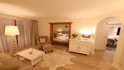 Ein Bett oder Betten in einem Zimmer der Unterkunft Parkhotel am Soier See