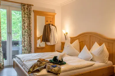 Ein Bett oder Betten in einem Zimmer der Unterkunft Landhaus Ertle