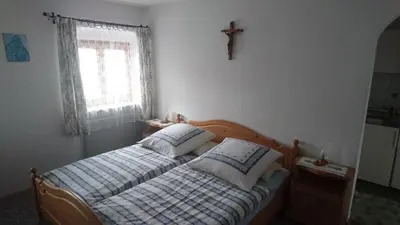 Ein Bett oder Betten in einem Zimmer der Unterkunft Ferienwohnung Karl