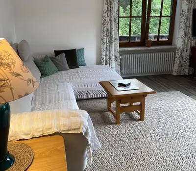 Ein Bett oder Betten in einem Zimmer der Unterkunft Weberhof