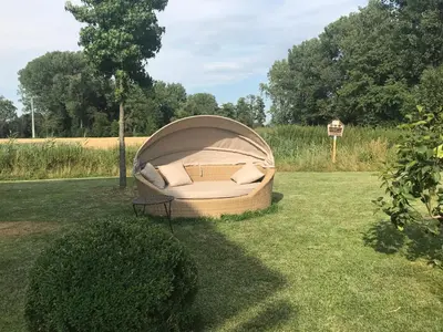 Ein Garten an der Unterkunft Landgut zur Mühle