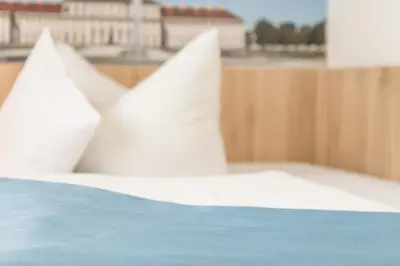 Ein Bett oder Betten in einem Zimmer der Unterkunft Hotel Blauer Karpfen