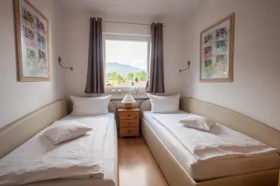 Ein Bett oder Betten in einem Zimmer der Unterkunft Alpenzauber Whg.25