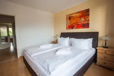 Ein Bett oder Betten in einem Zimmer der Unterkunft Alpenzauber Whg.25
