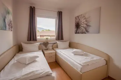 Ein Bett oder Betten in einem Zimmer der Unterkunft Alpenglühen Whg. 21