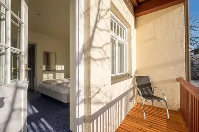 Ein Bett oder Betten in einem Zimmer der Unterkunft Hotel Gautinger Hof - Ruhig im Fünf-Seen-Land nahe S-Bahn und München