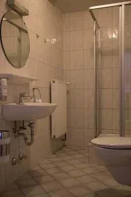 Ein Badezimmer in der Unterkunft Hotel Ristorante Milano