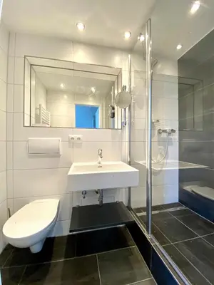 Ein Badezimmer in der Unterkunft Hotel zum Fischer