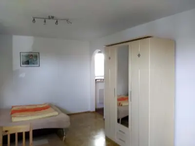 Ein Bett oder Betten in einem Zimmer der Unterkunft Ferienwohnung Griehl