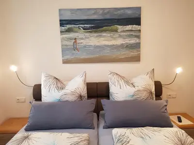 Ein Bett oder Betten in einem Zimmer der Unterkunft Ferienwohnung Rositta